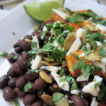 Roasted acorn squash with spicy beans